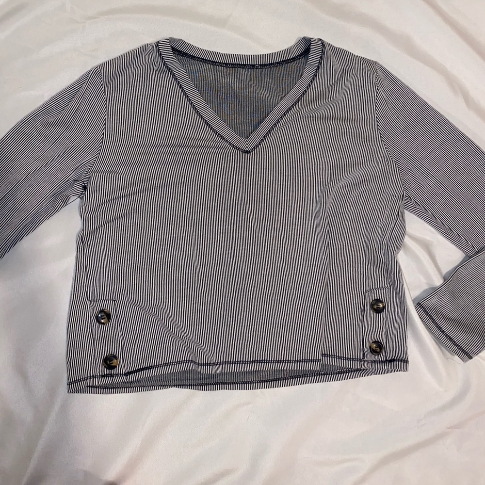 Striped Long Sleeve fits like a medium